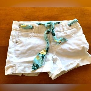 Like new Girls white jean shorts with tropical sash tie. ( removable).